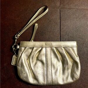 Coach gold wristlet